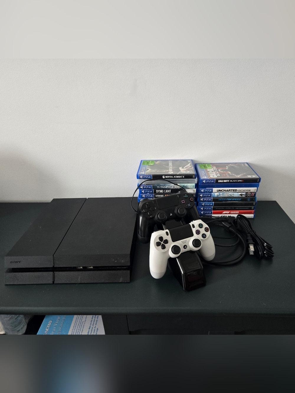 PlayStation 4 Console, 19 Games, 2 DualShock Controllers, Charging Dock, Cables